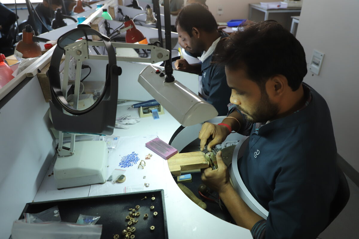 Hand gemstone setting by skilled craftsmen