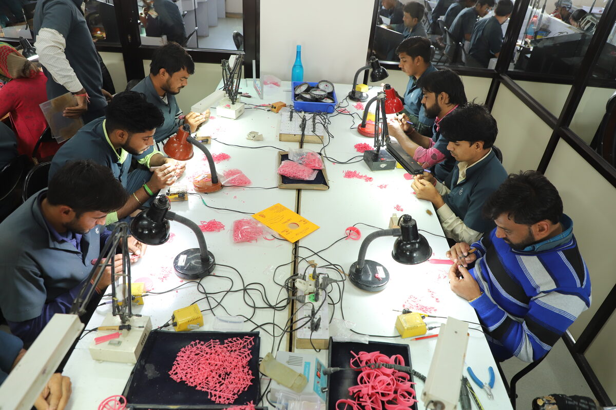 Team working at Pukhraj Gems manufacturing
